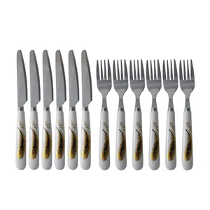 کارد و چنگال میوه خوری 12 پارچه طرح پر طلا کد 104968