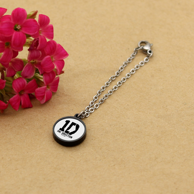 آویز ساعت زنانه ناکسیگو مدل شب تاب طرح One Direction کد AW7277