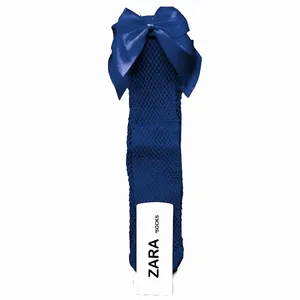 جوراب ساق بلند دخترانه مدل زنبوری  پاپیون دار