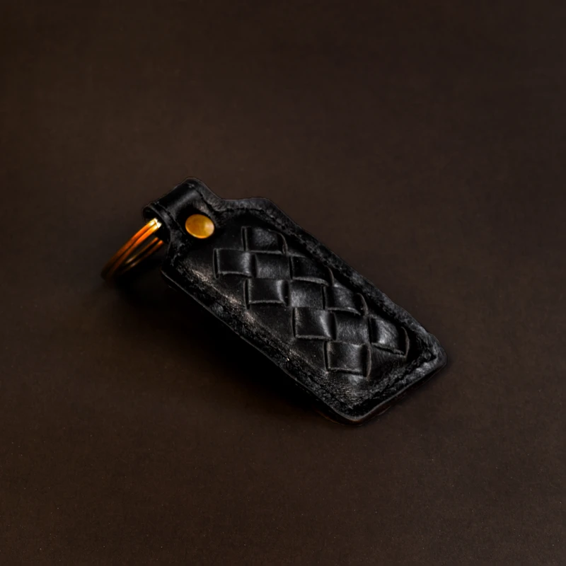 عکس شماره 3 : جاکلیدی چرمینه اسپرت مدل بافت