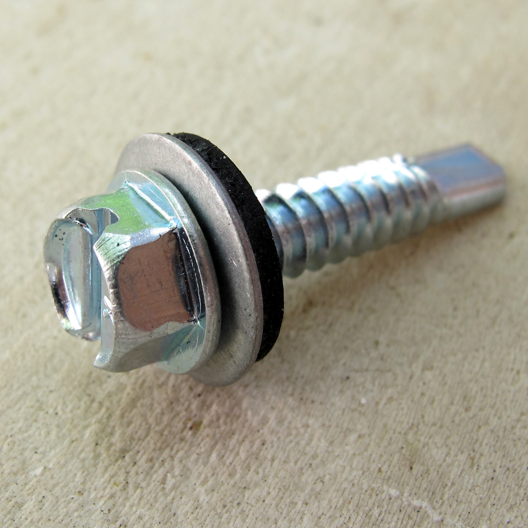 پیچ شيروانی سر مته مدل 32-14 بسته 500 عددی