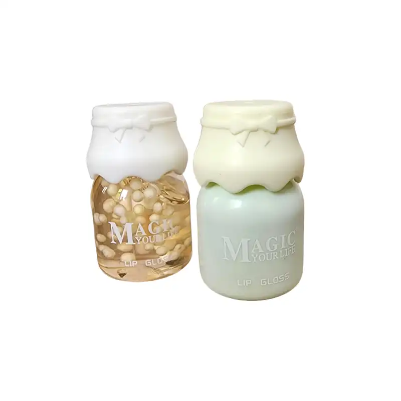 رژ لب مایع مجیک مدل شیشه شیر کد 411 به همراه برق لب مجیک