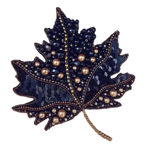 گل سینه زنانه مدل برگ