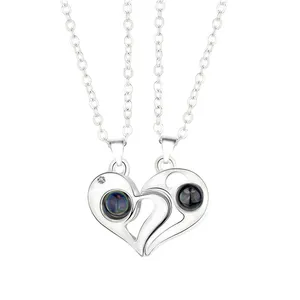 گردنبند مدل قلب مکمل دوستت دارم به صد زبان کد 252 بسته 2 عددی