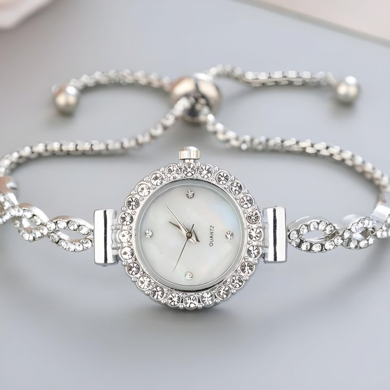 ساعت مچی عقربه ای زنانه مدل دور نگین بند کراواتی کد 1 ساعت مچی عقربه ای زنانه مدل دور نگین بند کراواتی کد 1