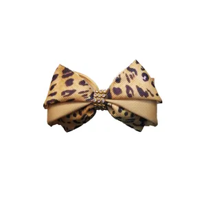 گیره مو دخترانه طرح پاپیونی پلنگی نگین دار کد 04