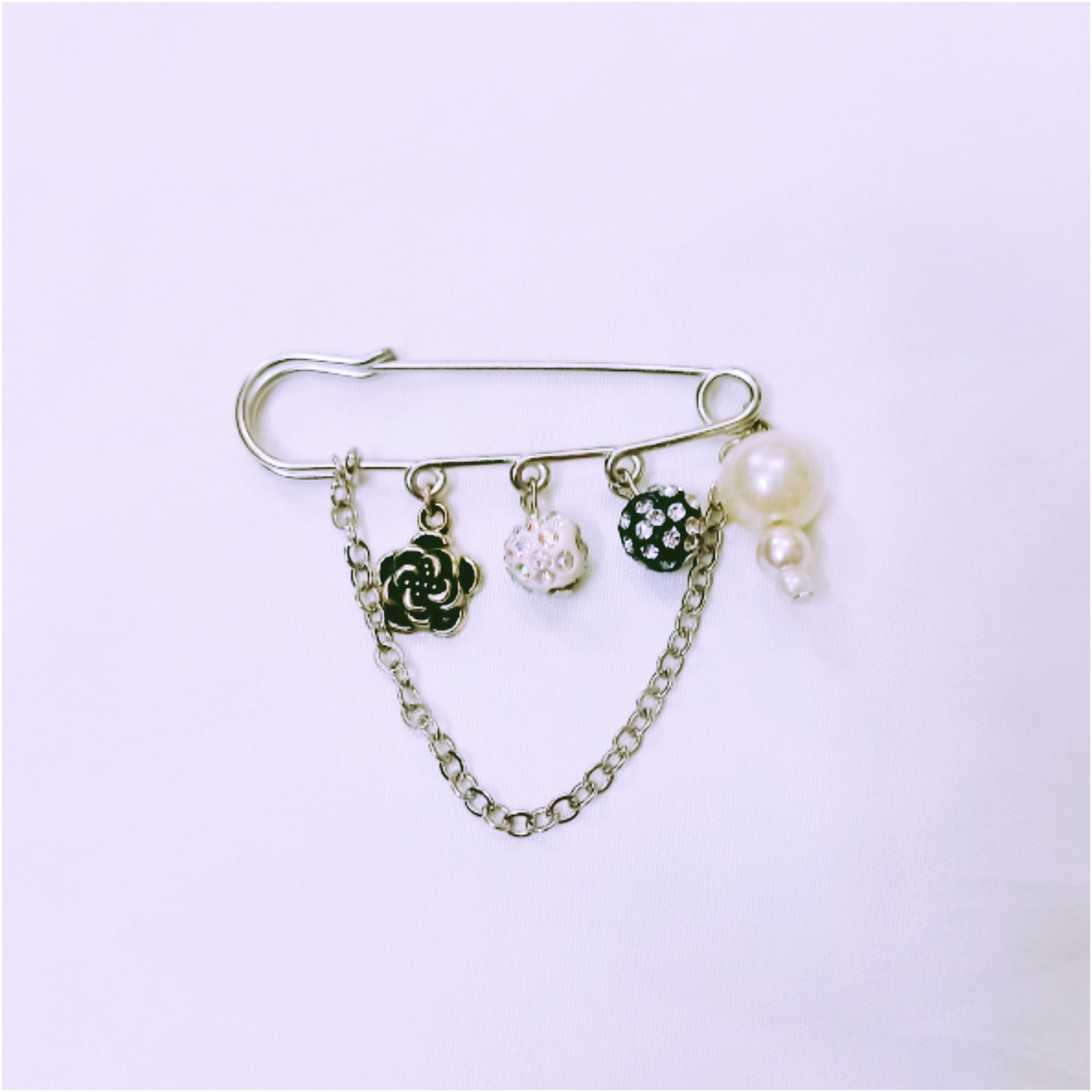 سنجاق سینه زنانه مدل گل 