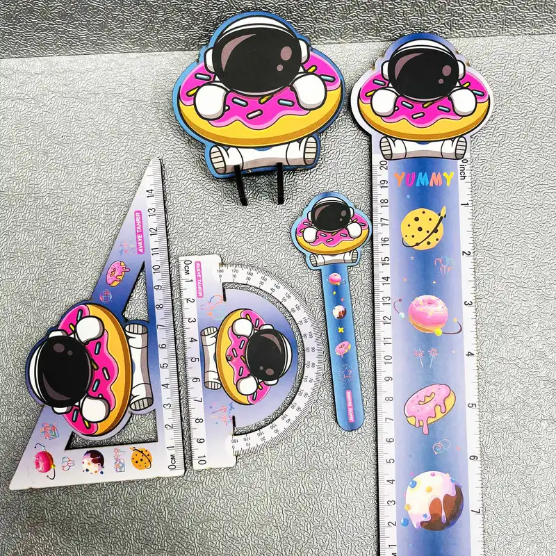 بسته لوازم تحریر مدل فضانورد و دونات مجموعه 5 عددی