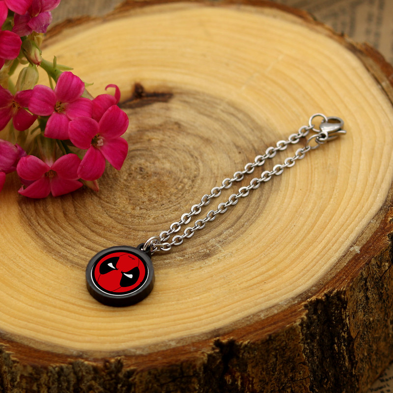 آویز ساعت زنانه ناکسیگو مدل شب تاب طرح ددپول کد AW8755