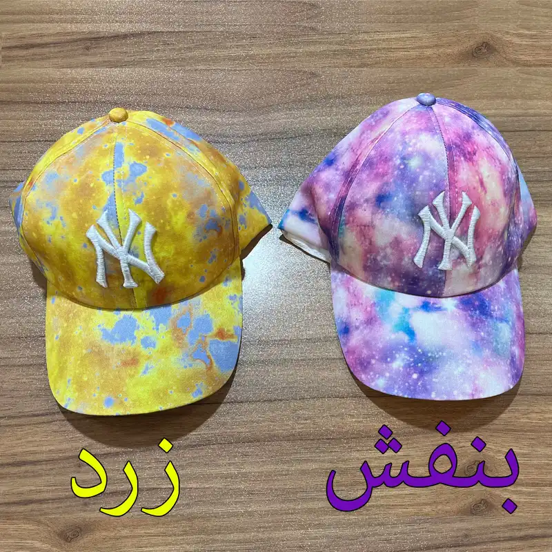 کلاه کپ مدل گلدوزی آبرنگی طرح ان وای