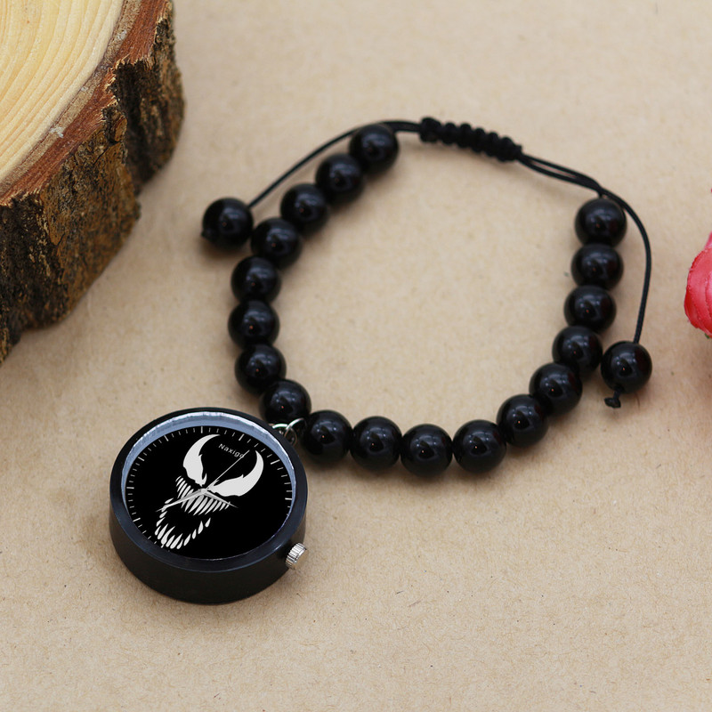 ساعت مچی عقربه ای ناکسیگو مدل ونوم کد BF13076 ساعت مچی عقربه ای ناکسیگو مدل ونوم کد BF13076