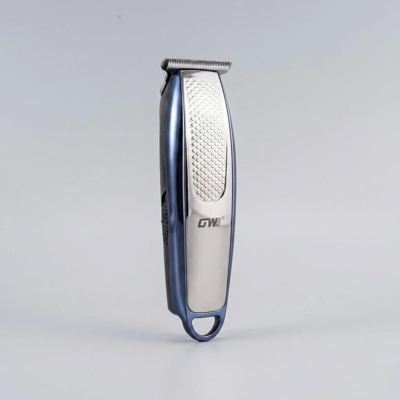 ماشین اصلاح موی سر و صورت جی دبلیو مدل GW-9753، صفر زن و خط زن، تیغه کروم، موتور 7000 دور در دقیقه، باتری 600 میلی‌آمپر ساعت، نمایشگر ال سی دی، شارژ با کابل USB، همراه با 3 شانه در سایزهای 0.5، 1 و 1.5 میلی‌متر