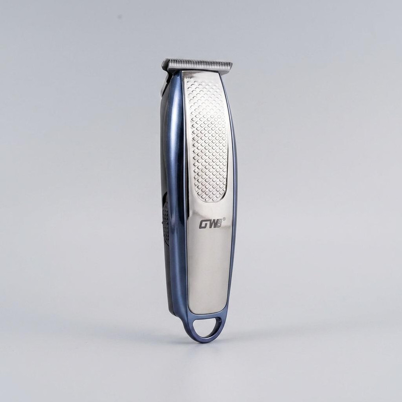 ماشین اصلاح موی سر و صورت جی دبلیو مدل GW-9753، صفر زن و خط زن، تیغه کروم، موتور 7000 دور در دقیقه، باتری 600 میلی‌آمپر ساعت، نمایشگر ال سی دی، شارژ با کابل USB، همراه با 3 شانه در سایزهای 0.5، 1 و 1.5 میلی‌متر