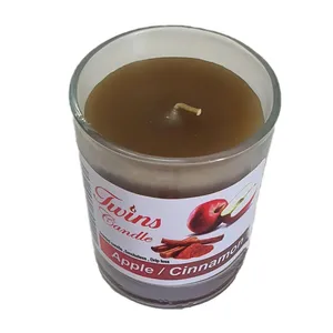 شمع لیوانی مدل رایحه سیب و دلرچین