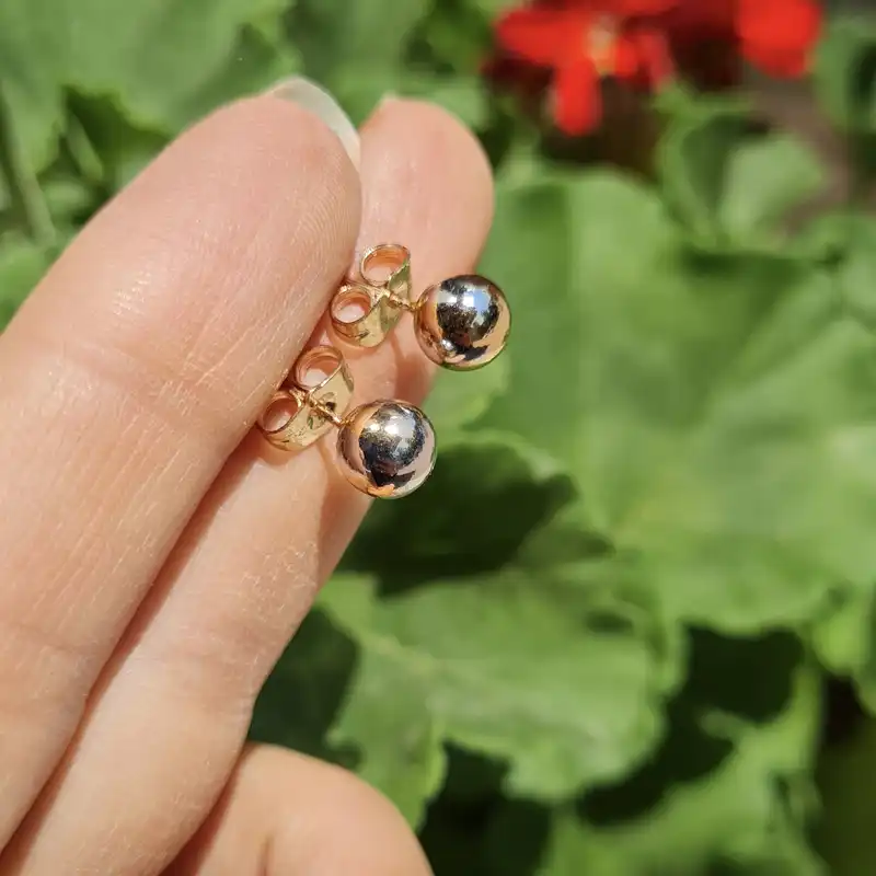 گوشواره ژوپینگ مدل توپی