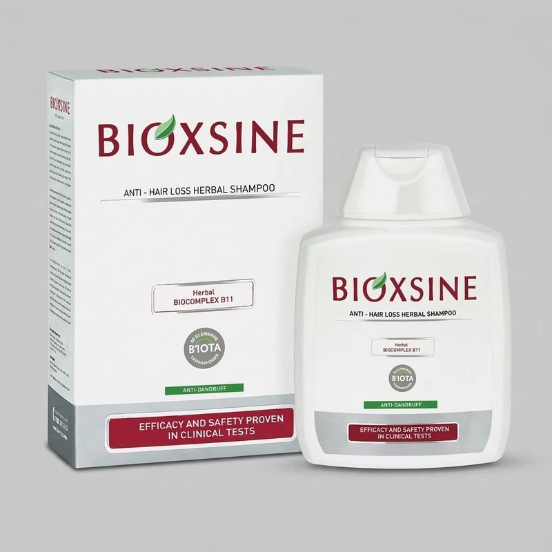 شامپو ضد ریزش و ضد شوره بیوتا مدل BIOXSINE حجم 300 میلی‌لیتر، تقویت‌کننده و تغذیه‌کننده مو با ویتامین‌ها و مواد معدنی، مناسب انواع مو، کاملاً گیاهی و بدون مواد رنگی
