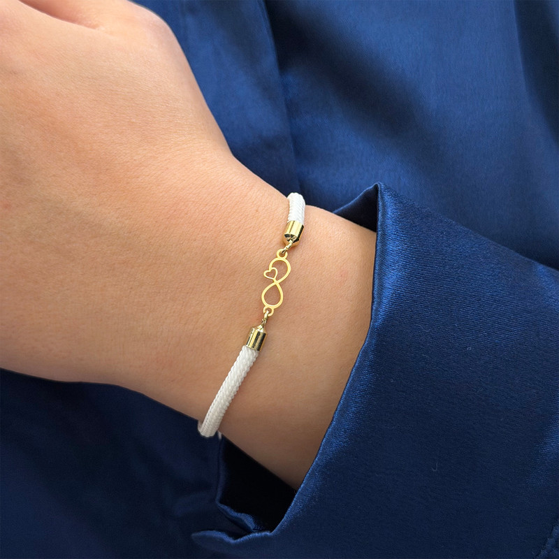 دستبند طلا 18 عیار زنانه با بند بافت کرابو مدل بی نهایت و قلب