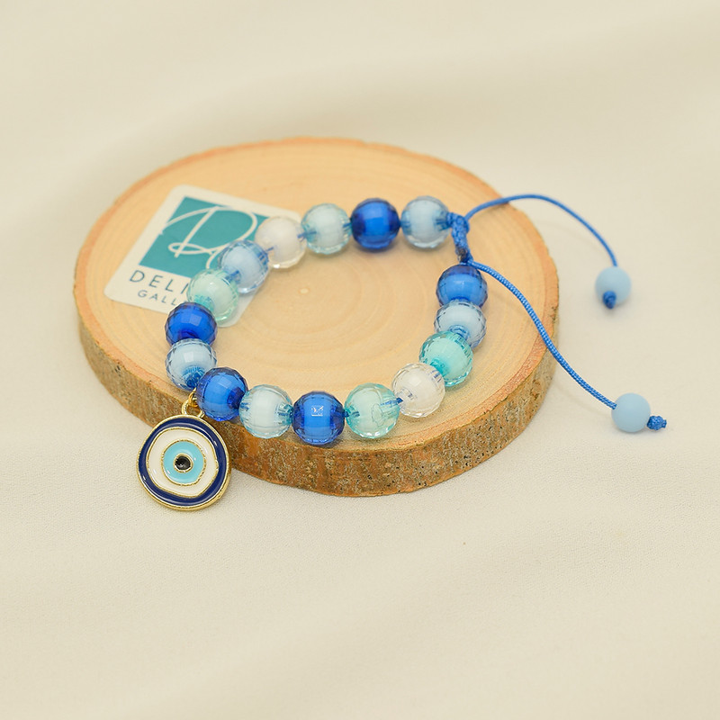 دستبند دخترانه دلنار گالری مدل چشم نظر و مهره آبنباتی دستبند دخترانه دلنار گالری مدل چشم نظر و مهره آبنباتی