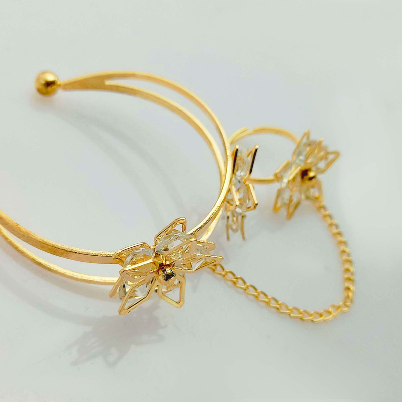 دستبند دخترانه طرح گل چهار پر مدل نگین دار کد 800DSD دستبند دخترانه طرح گل چهار پر مدل نگین دار کد 800DSD