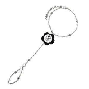دستبند زنانه ناکسیگو مدل تمیمه طرح آرایشگری کد TM11186