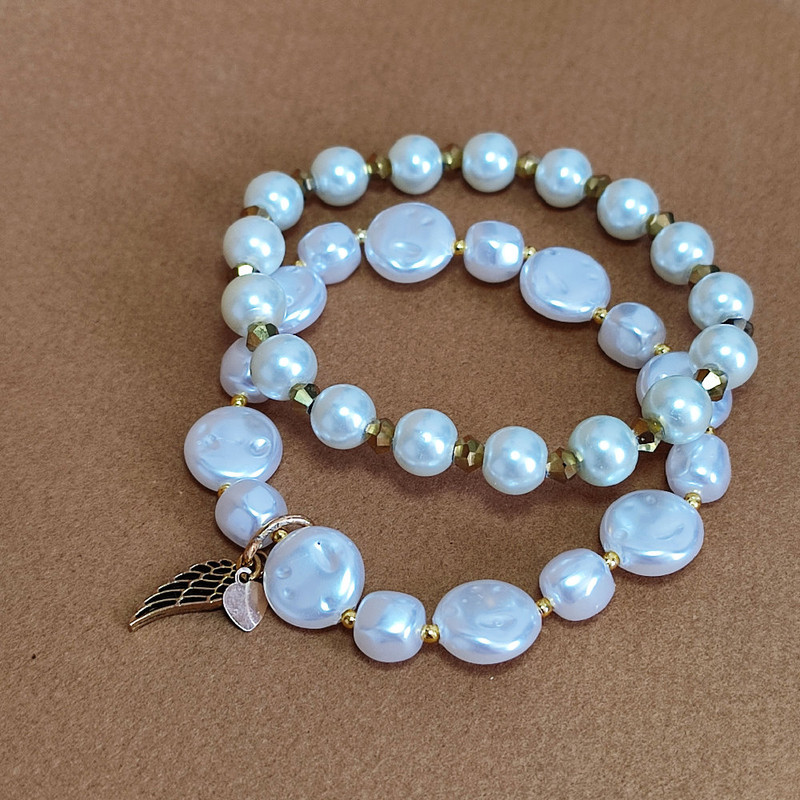 دستبند زنانه مدل مروارید مینیمال مجموعه 2 عددی