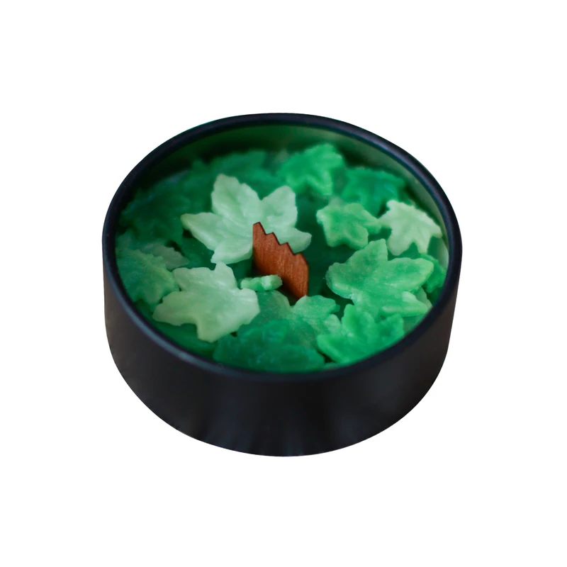 شمع دست‌ساز بدون‌بو مدل قوطی برگ زمان اتمام 8 ساعت