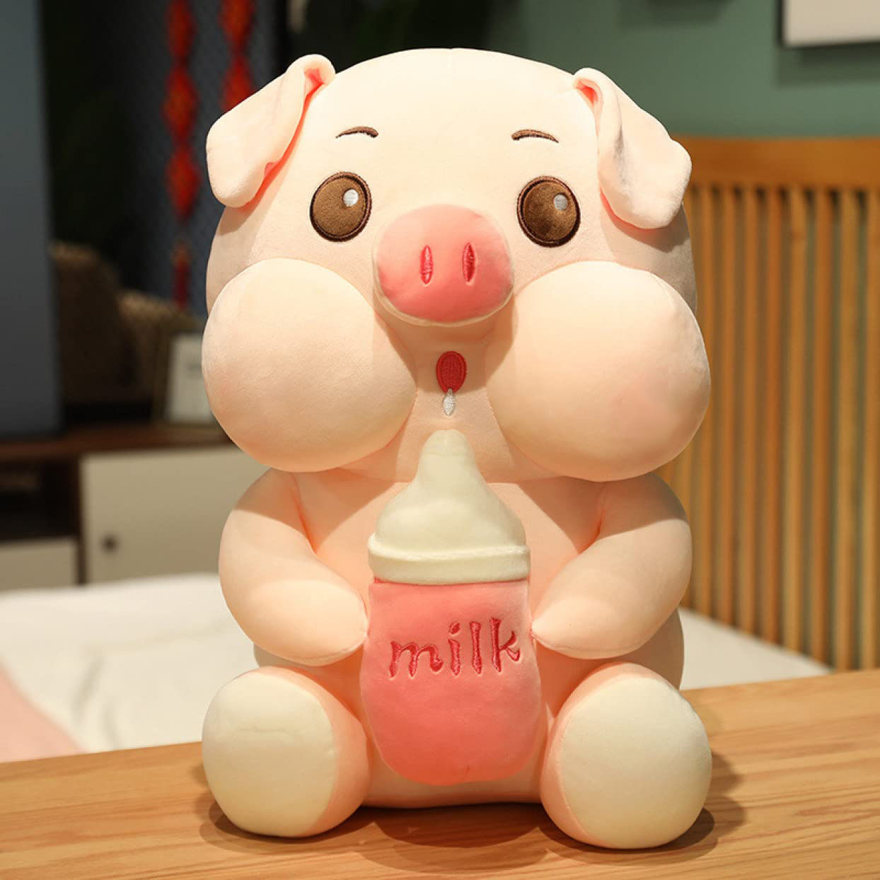 عروسک مدل خوک بچه و بطری شیر کد DB20 ارتفاع 42 سانتی‌متر