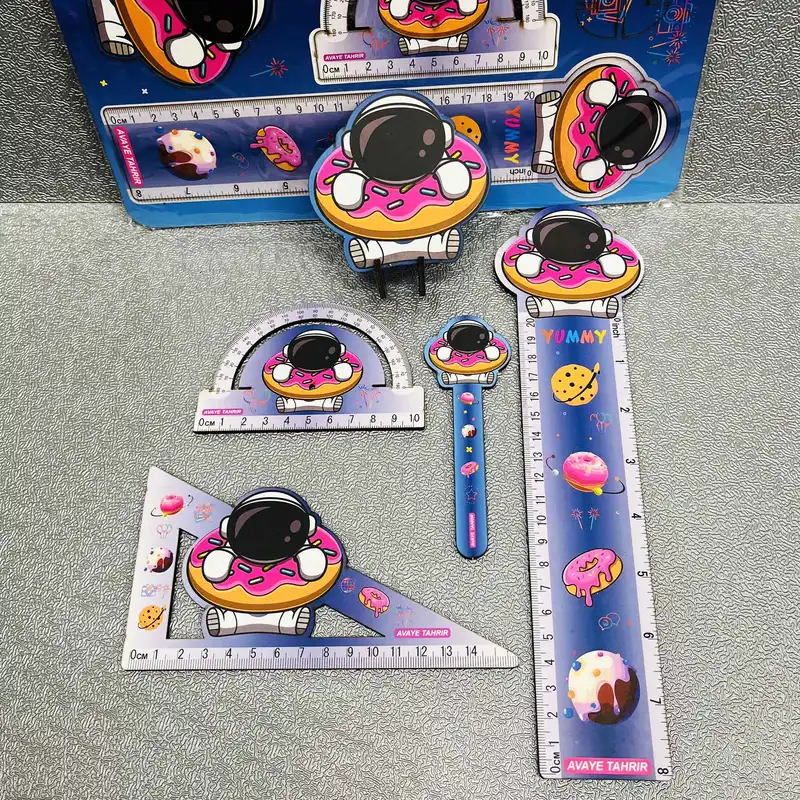 بسته لوازم تحریر مدل فضانورد و دونات مجموعه 5 عددی