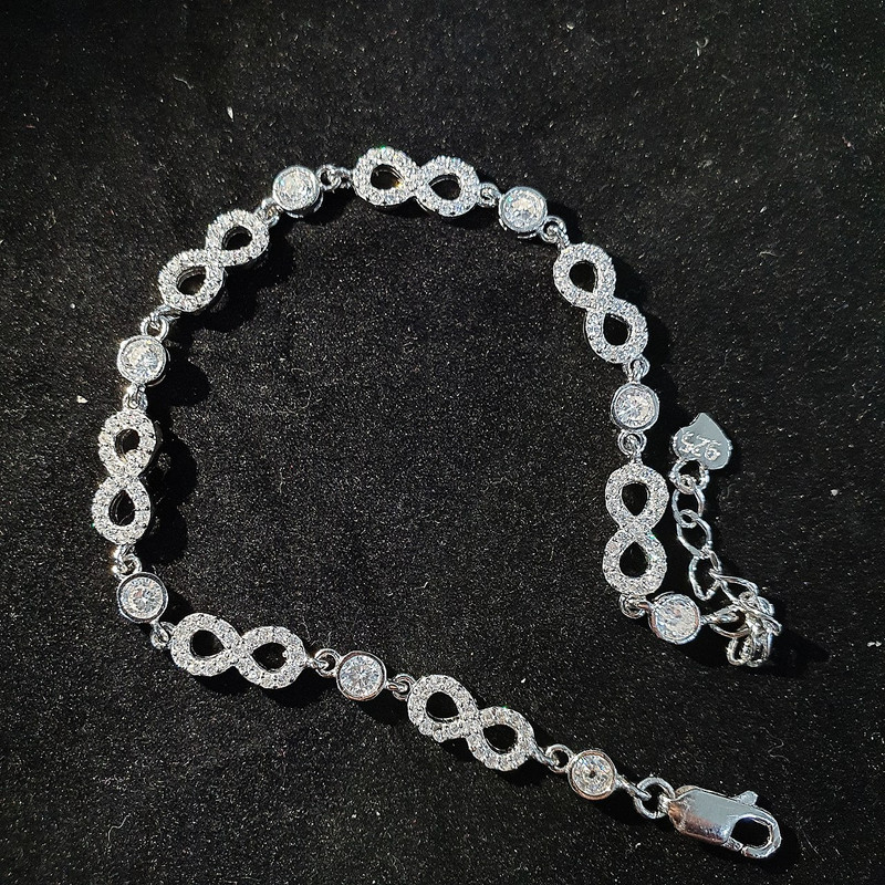 دستبند نقره زنانه جی تی ای مدل بینهایت