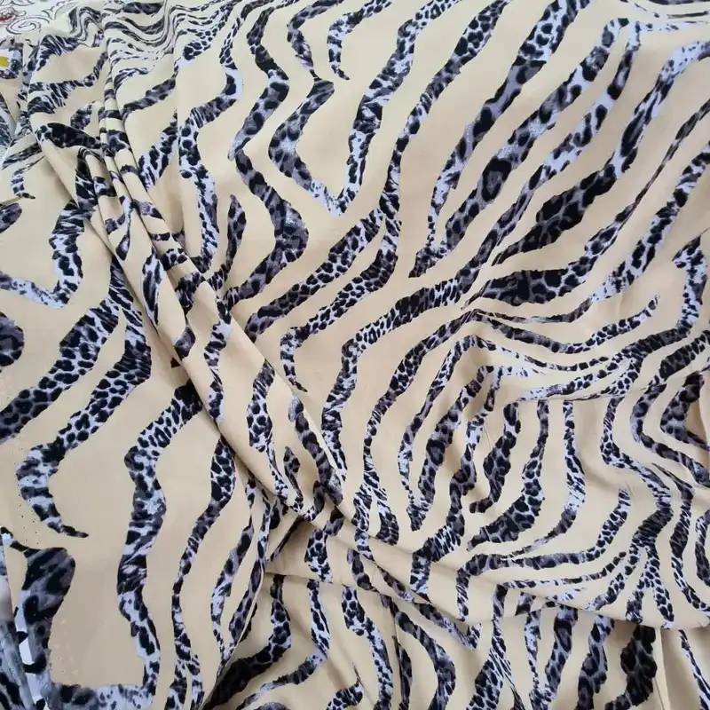 پارچه لباس مدل کودری نخی طرح پوست ماری