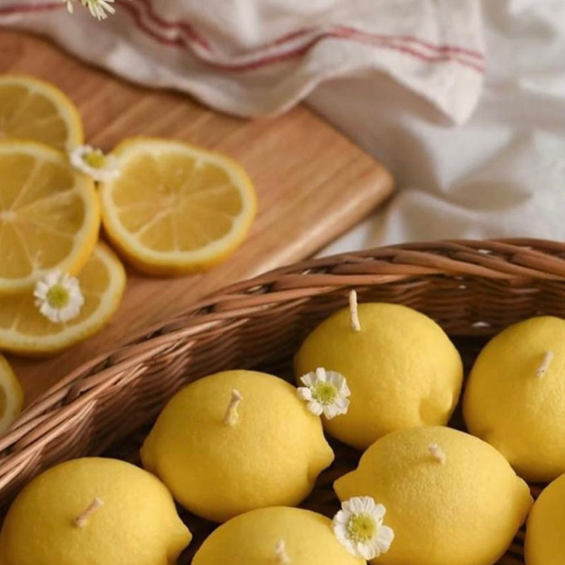 شمع دست ساز معطر مدل لیمو با رایحه لیمو  زمان اتمام 4 ساعت