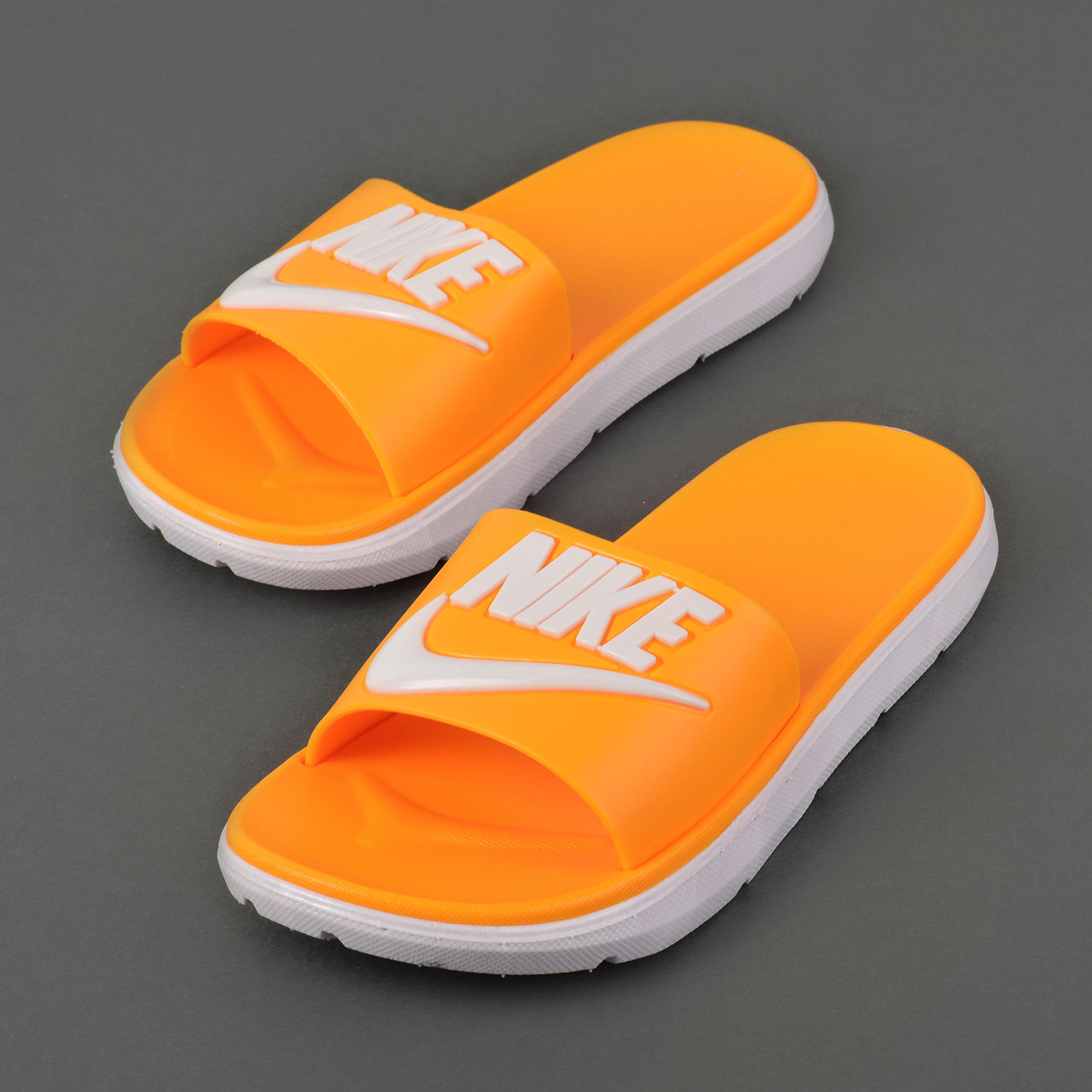 Nike best sale orange slippers