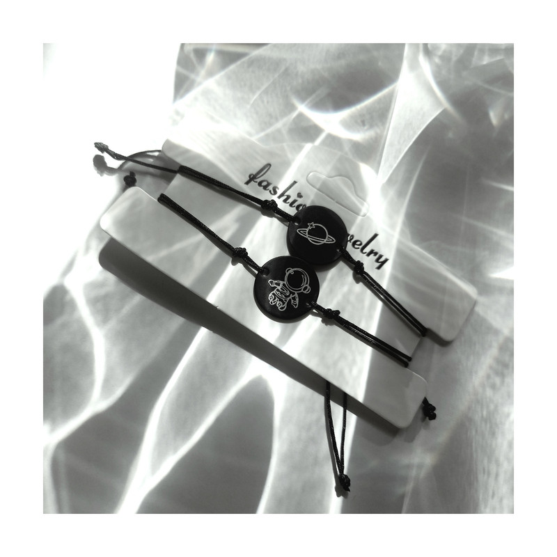 دستبند مدل دوستی فضانورد و سیاره زحل بسته 2 عددی