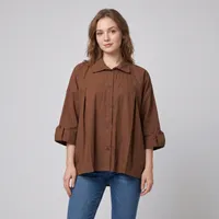 شومیز زنانه لینن آستین سه ربع مدل آشیلدا کد 027 با یقه برگردان، قد روی باسن، تنخور معمولی و بسته شدن با چهار دکمه مناسب استفاده روزمره و مهمانی