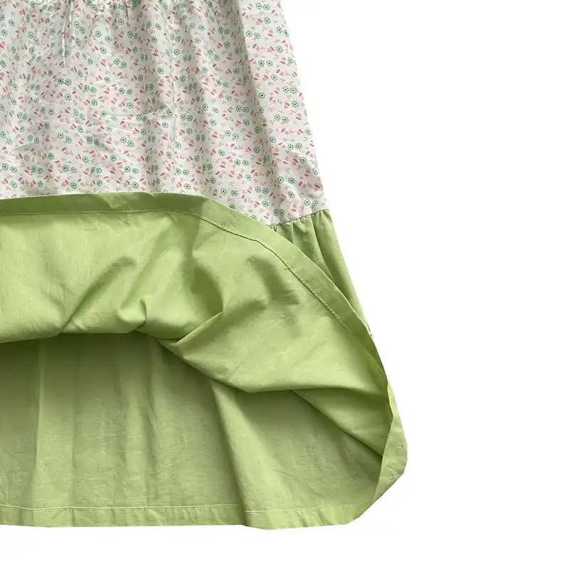 دامن چین‌دار زنانه مدل کمر کش طبقه ای رنگ سبز مغز پسته‌ای