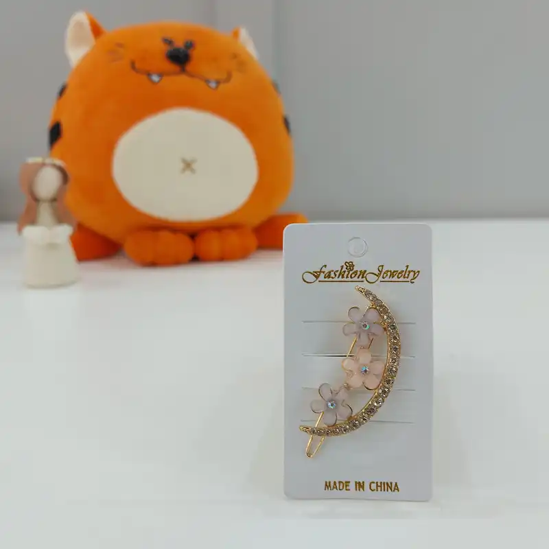 گیره مو زنانه مدل ماه نگینی