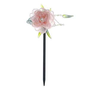 گیره مو زنانه مدل کانزاشی طرح گل پارچه ای