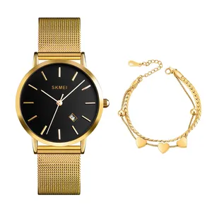 ساعت مچی عقربه‌ای کوارتز زنانه اسکمی مدل 1530GD به همراه دستبند