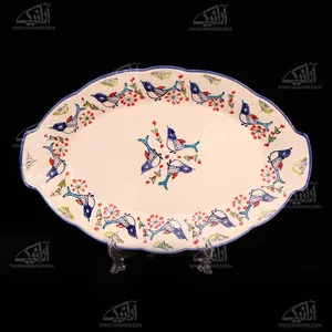 سینی سفالی‏ نقاشی زیر لعابی‏  آرانیک رنگ ‏سفید‏ طرح ‏پرنده‏ مدل 1000900001