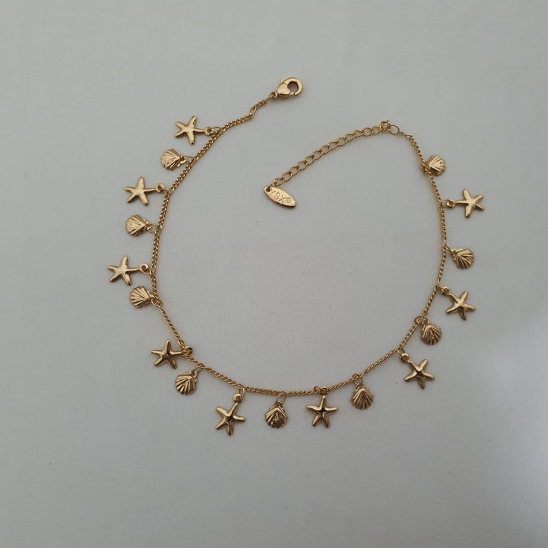 پابند زنانه وای اس ایکس مدل صدف و ستاره دریای کد 11 پابند زنانه وای اس ایکس مدل صدف و ستاره دریای کد 11