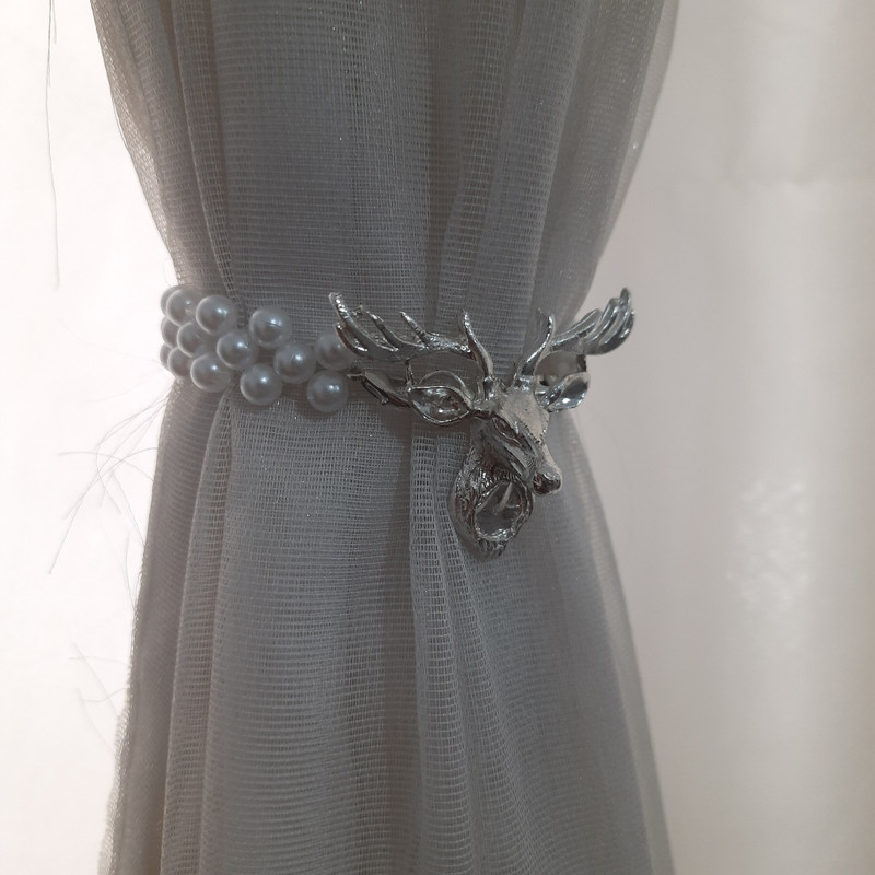 پرده جمع کن مدل گوزن