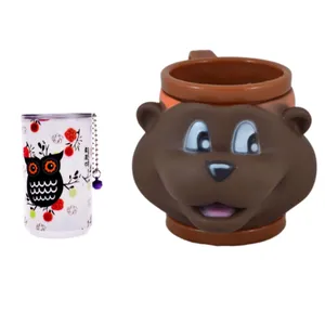 لیوان کودک مدل KABOOK BEAR به همراه دستمال مرطوب مدل owl 4 بسته 30 عددی