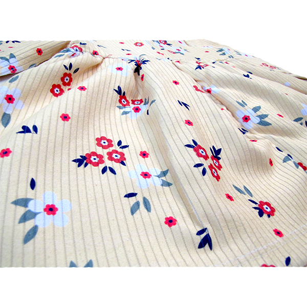 پیراهن نوزادی مدل گلدار رنگ لیمویی