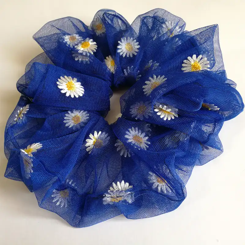 کش مو زنانه مدل گلدار بابونه