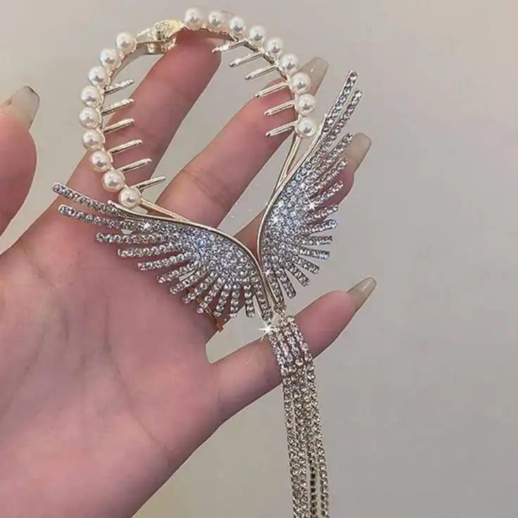 گیره مو زنانه مدل آبشاری گوجه ای طرح بال فرشته آویز دار