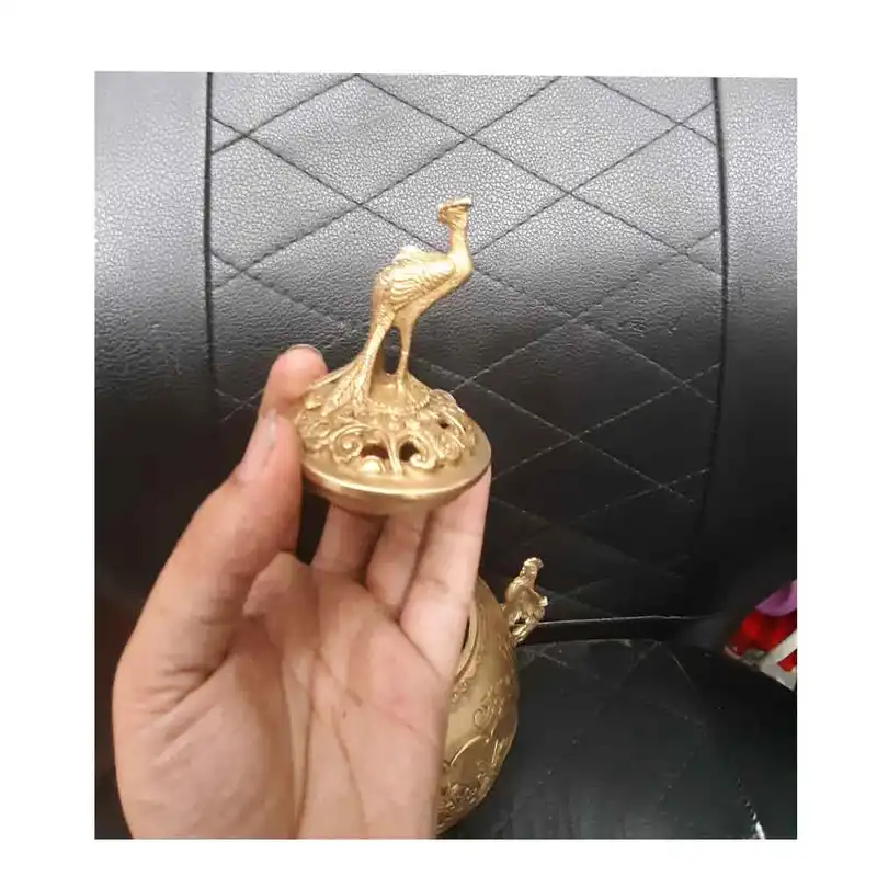 دکوری برنجی مدل آتشدان طرح گل و طاووس کد A1 بسته دو عددی