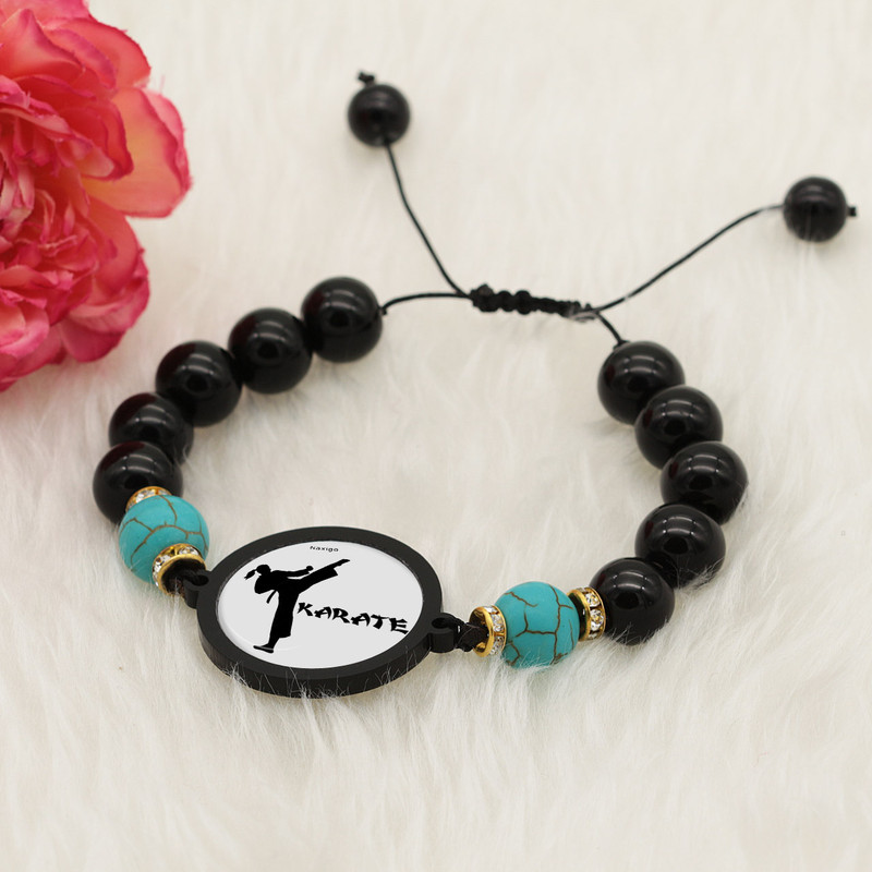 دستبند زنانه ناکسیگو طرح کاراته کد BR4008 دستبند زنانه ناکسیگو طرح کاراته کد BR4008