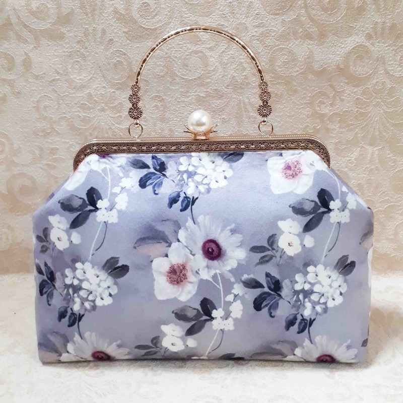 کیف مجلسی زنانه مدل پارچه گلدار