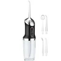 دستگاه شست&zwnj;وشوی دهان و دندان شارژی مدل Portable12 به همراه 4 سری