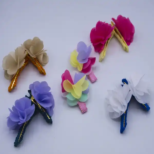 گیره مو زنانه مدل فلاوری 010 بسته 10 عددی